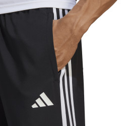 Vycházkové kalhoty adidas Tiro 23 League Woven