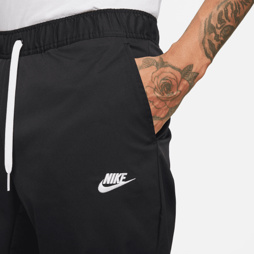 Vycházkové kalhoty Nike Club Woven Tapered Leg